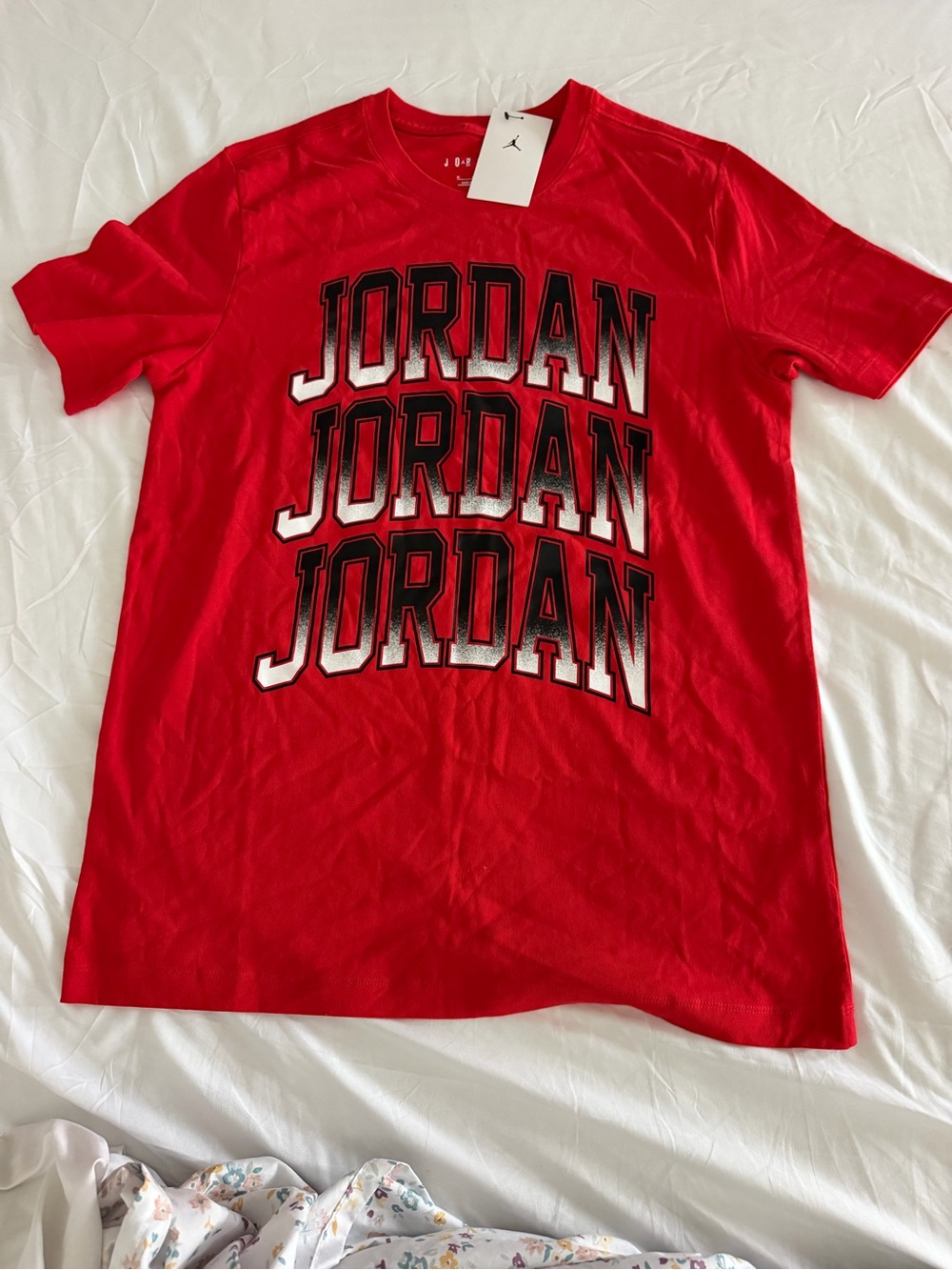 Jordan Men's Red Graphic Repeat Logo Tee